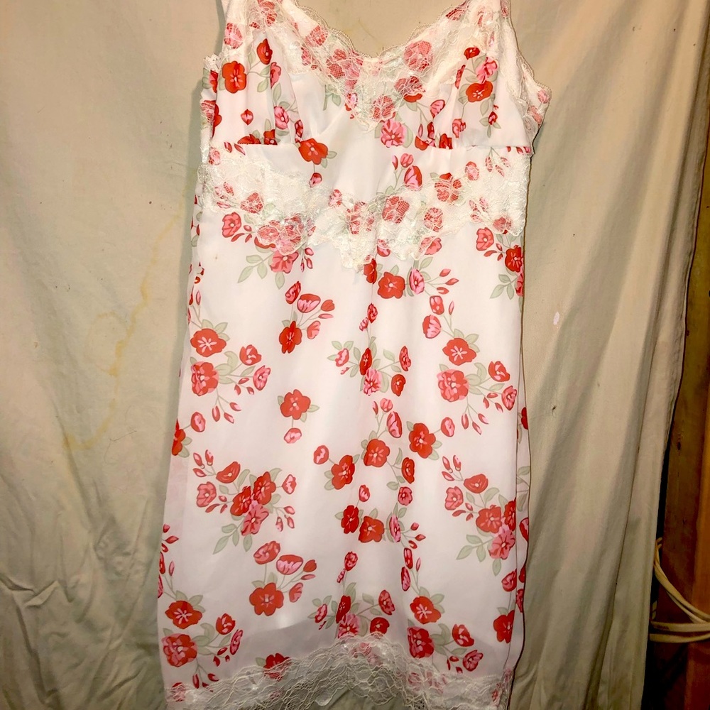 White silky dress with flowers.